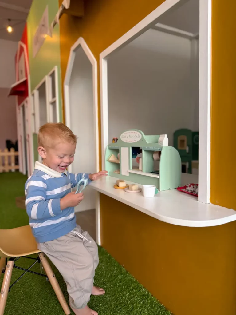Indoor play village for kids with wooden toys in cape town
